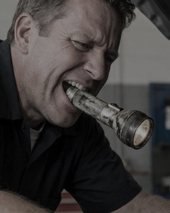 Flashlight held in the teeth